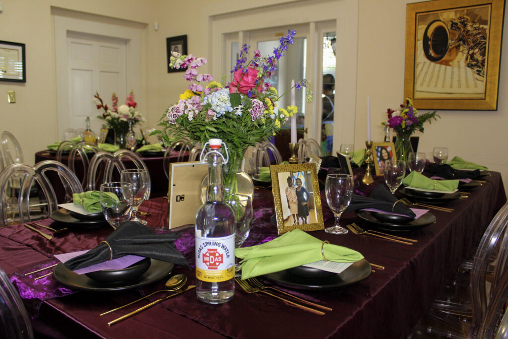 a purple and green luxury dinner tablescape at the opera house