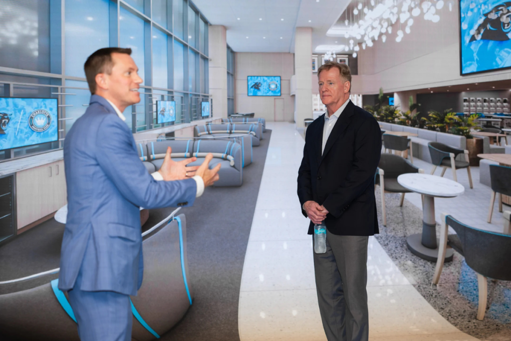 Two virtual men talking inside Panthers Momintum Sales Experience